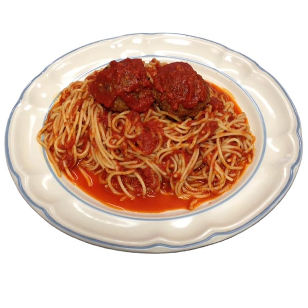 Spaghetti with two large meatballs covered in red marinara sauce on a white plate with blue trim.